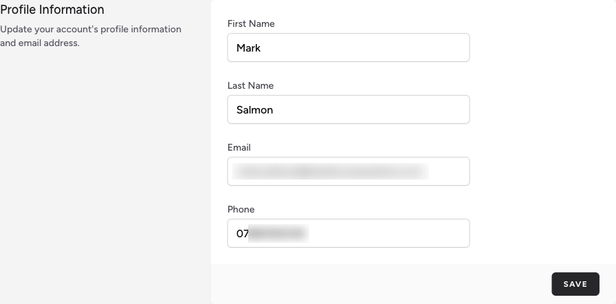 Screenshot: The Profile Information section showing the circular profile photo with "Select A New Photo" and "Remove Photo" buttons, and the First Name, Last Name, Email, and Phone fields below